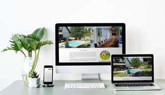 villa alsace website mockup with flower deco on a table ordi,ipad et mobile